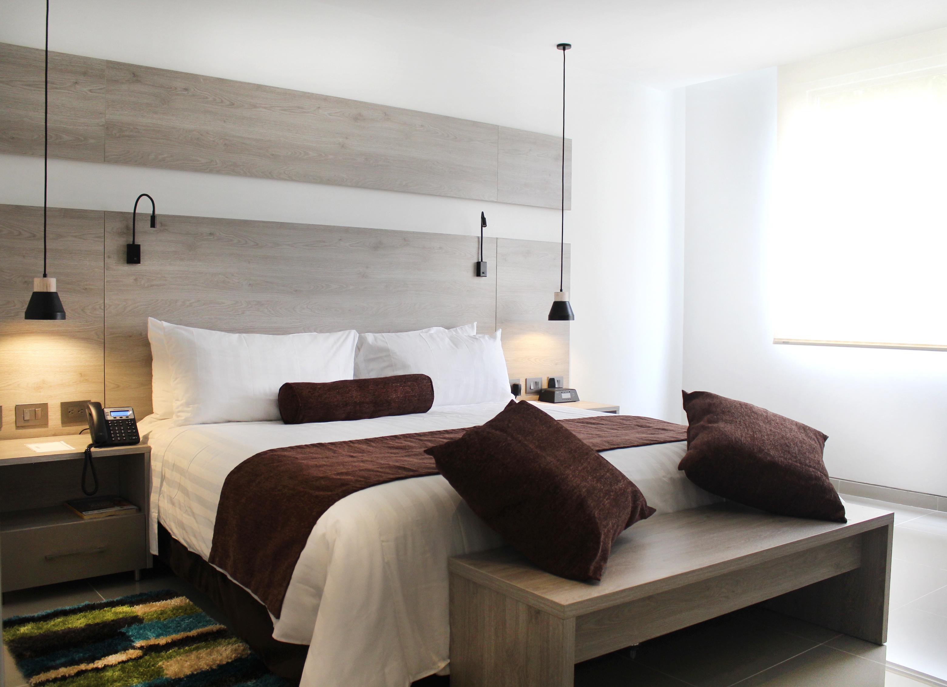 Hotel Barranquilla Plaza Bagian luar foto A bedroom at the hotel