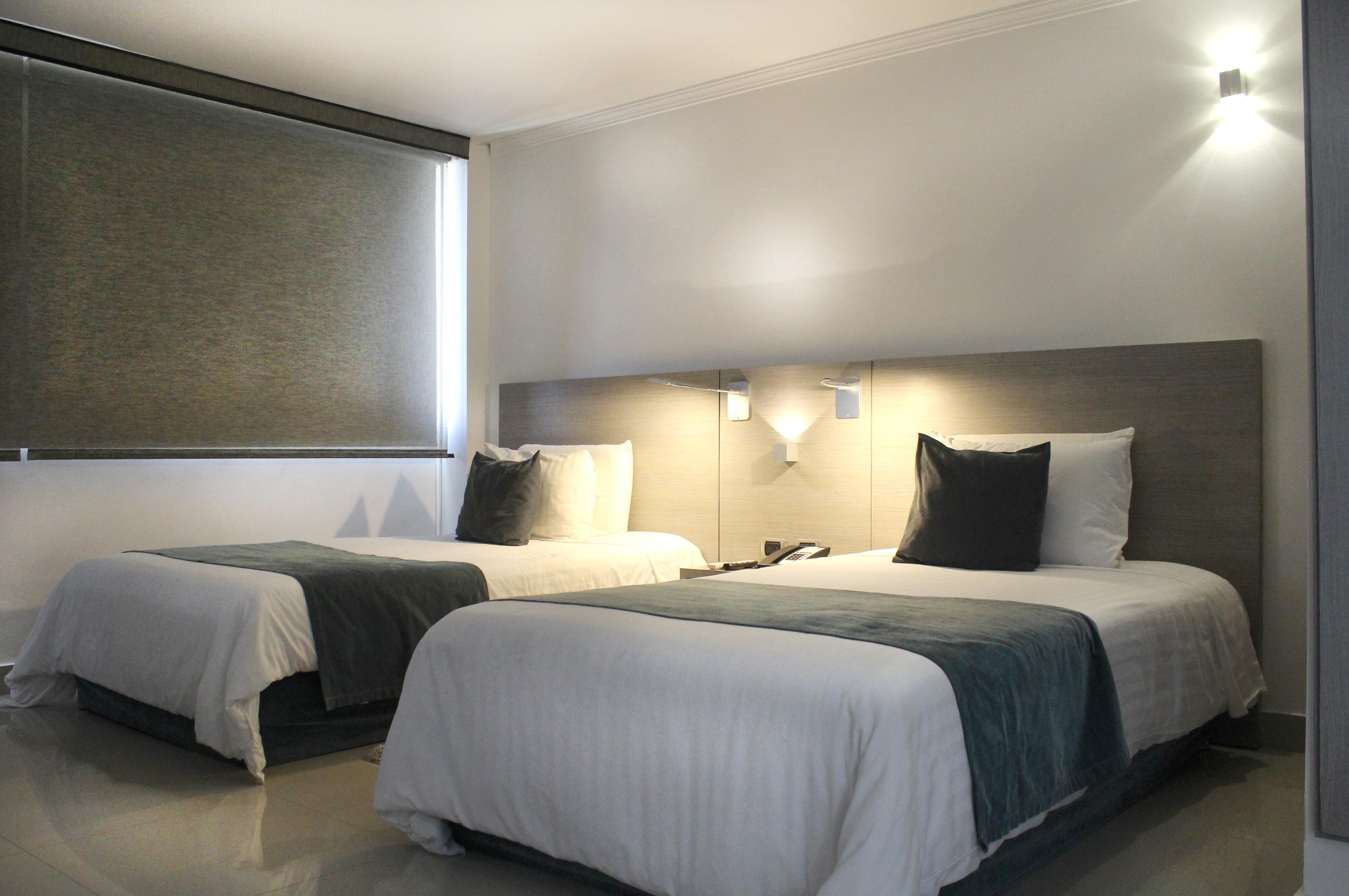 Hotel Barranquilla Plaza Bagian luar foto A room at the hotel